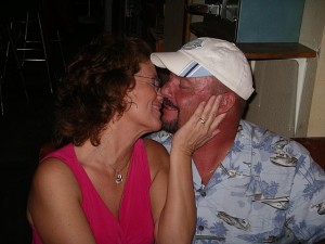 Judy and Kevin kissing